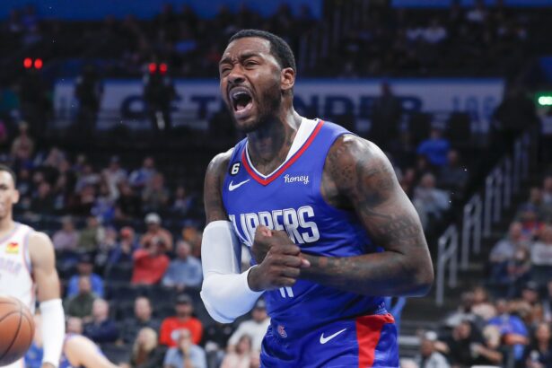 Oct 27, 2022; Oklahoma City, Oklahoma, USA; LA Clippers guard John Wall (11) reacts after scoring a basket against the Oklahoma City Thunder during the second half at Paycom Center. Oklahoma City won 118-110. Mandatory Credit: Alonzo Adams-USA TODAY Sports