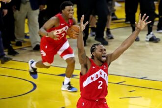 Jun 13, 2019; Oakland, CA, USA; Toronto Raptors forward Kawhi Leonard (2) and Toronto Raptors guard Kyle Lowry (7) celebrate winning the NBA Championship over the Golden State Warriors against game six of the 2019 NBA Finals at Oracle Arena. Mandatory Credit: Sergio Estrada-Imagn Images