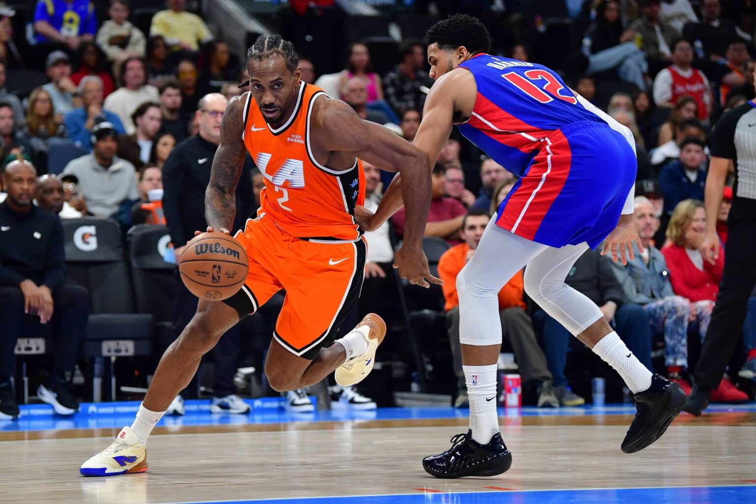 Dec 28, 2025; Inglewood, California, USA; Los Angeles Clippers forward Kawhi Leonard (2) moves to the basket against Detroit Pistons forward Tobias Harris (12) during the first half at Intuit Dome. Mandatory Credit: Gary A. Vasquez-Imagn Images