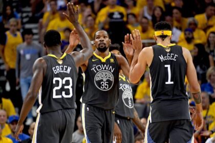 June 3, 2018; Oakland, CA, USA; Golden State Warriors forward Kevin Durant (35) celebrates with forward Draymond Green (23) and center JaVale McGee (1) during the second quarter in game two of the 2018 NBA Finals against the Cleveland Cavaliers at Oracle Arena. The Warriors defeated the Cavaliers 122-103 for a 2-0 lead in the series. Mandatory Credit: Kyle Terada-Imagn Images