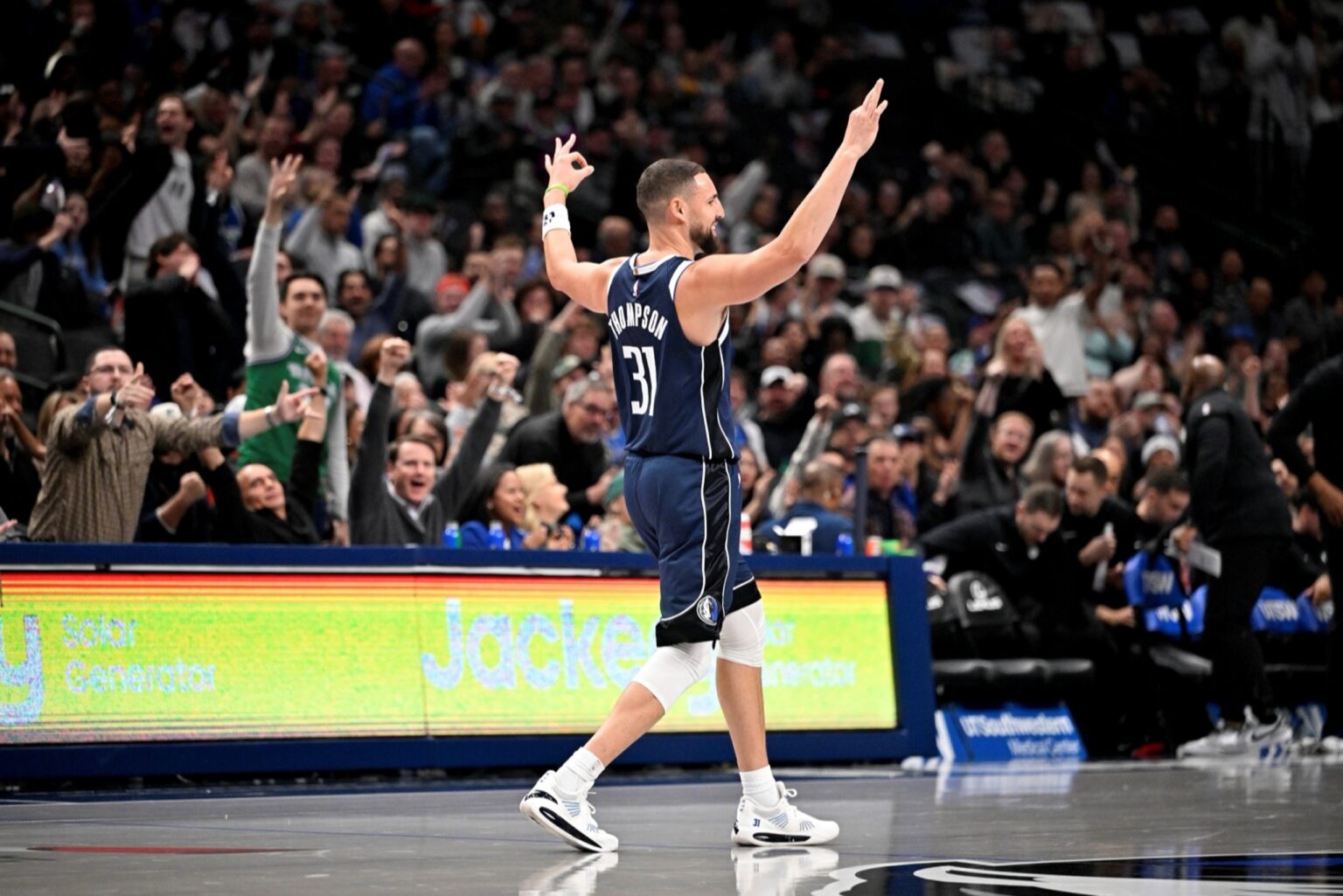 Dec 12, 2025; Dallas, Texas, USA; Dallas Mavericks guard Klay Thompson (31) celebrates after making a three point basket against the Brooklyn Nets during the second quarter at the American Airlines Center. Mandatory Credit: Jerome Miron-Imagn Images