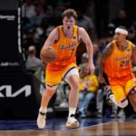 Nov 29, 2025; Charlotte, North Carolina, USA; Charlotte Hornets guard Kon Knueppel (7) brings the ball up court against the Toronto Raptors during the first quarter at Spectrum Center. Mandatory Credit: Jim Dedmon-Imagn Images