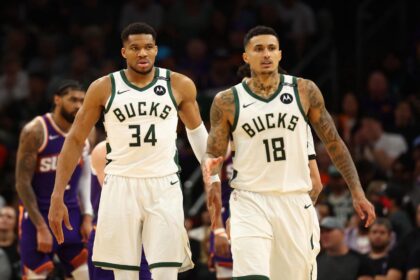Mar 24, 2025; Phoenix, Arizona, USA; Milwaukee Bucks forward Kyle Kuzma (18) and forward Giannis Antetokounmpo (34) against the Phoenix Suns at Footprint Center. Mandatory Credit: Mark J. Rebilas-Imagn Images