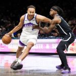 Dec 4, 2025; Brooklyn, New York, USA; Utah Jazz forward Kyle Anderson (2) moves the ball past Brooklyn Nets guard Terance Mann (14) during the fourth quarter at Barclays Center. Mandatory Credit: Tom Horak-Imagn Images