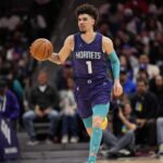 Mar 20, 2025; Charlotte, North Carolina, USA; Charlotte Hornets guard LaMelo Ball (1) brings the ball up court against the New York Knicks during the second half at Spectrum Center. Mandatory Credit: Jim Dedmon-Imagn Images