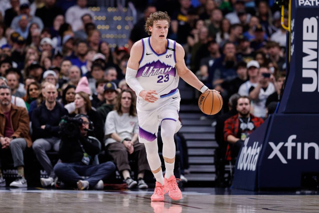 Dec 22, 2025; Denver, Colorado, USA; Utah Jazz forward Lauri Markkanen (23) dribbles the ball up court in the third quarter against the Denver Nuggets at Ball Arena. Mandatory Credit: Isaiah J. Downing-Imagn Images