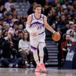 Dec 22, 2025; Denver, Colorado, USA; Utah Jazz forward Lauri Markkanen (23) dribbles the ball up court in the third quarter against the Denver Nuggets at Ball Arena. Mandatory Credit: Isaiah J. Downing-Imagn Images