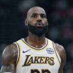 Los Angeles Lakers forward Lebron James (23) reacts against the LA Clippers in the second half at Intuit Dome.