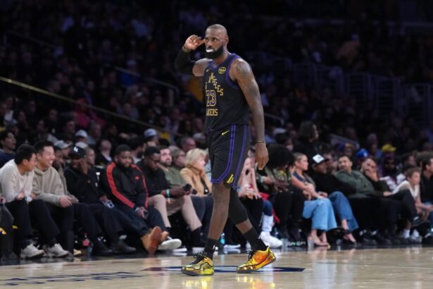 Nov 18, 2025; Los Angeles, California, USA; Los Angeles Lakers forward LeBron James (23) reacts against the Utah Jazz in the fourth quarter at Crypto.com Arena. Mandatory Credit: Kirby Lee-Imagn Images
