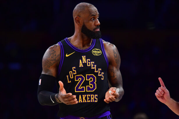 Dec 30, 2025; Los Angeles, California, USA; Los Angeles Lakers forward LeBron James (23) reacts during the second half at Crypto.com Arena. Mandatory Credit: Gary A. Vasquez-Imagn Images