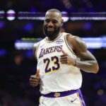 Dec 7, 2025; Philadelphia, Pennsylvania, USA; Los Angeles Lakers forward Lebron James (23) reacts after a play against the Philadelphia 76ers during the second quarter at Xfinity Mobile Arena. Mandatory Credit: Bill Streicher-Imagn Images