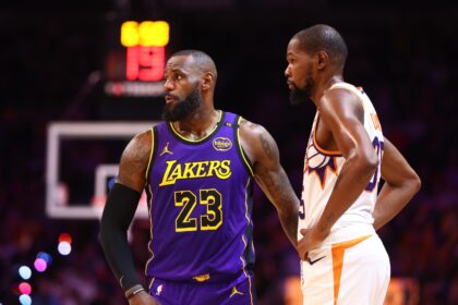 Oct 28, 2024; Phoenix, Arizona, USA; Los Angeles Lakers forward LeBron James (23) against Phoenix Suns forward Kevin Durant (35) at Footprint Center. Mandatory Credit: Mark J. Rebilas-Imagn Images