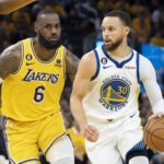Golden State Warriors guard Stephen Curry (30) dribbles the basketball against Los Angeles Lakers forward LeBron James (6) during the fourth quarter in game five of the 2023 NBA playoffs conference semifinals round at Chase Center.