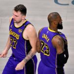 Apr 9, 2025; Dallas, Texas, USA; Los Angeles Lakers guard Luka Doncic (77) and forward LeBron James (23) during the game between the Dallas Mavericks and the Los Angeles Lakers at American Airlines Center. Mandatory Credit: Jerome Miron-Imagn Images