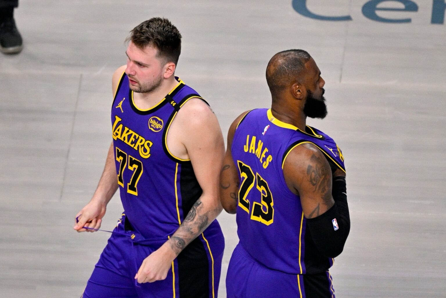 Apr 9, 2025; Dallas, Texas, USA; Los Angeles Lakers guard Luka Doncic (77) and forward LeBron James (23) during the game between the Dallas Mavericks and the Los Angeles Lakers at American Airlines Center. Mandatory Credit: Jerome Miron-Imagn Images