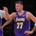 Los Angeles Lakers guard Luka Doncic (77) reacts after he was poked in the eye during the first half against the San Antonio Spurs at Crypto.com Arena.