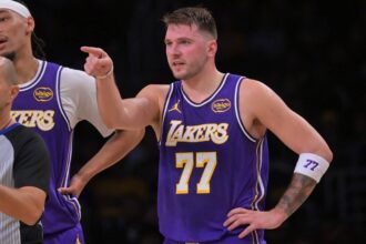 Los Angeles Lakers guard Luka Doncic (77) reacts after he was poked in the eye during the first half against the San Antonio Spurs at Crypto.com Arena.
