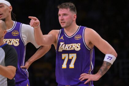 Los Angeles Lakers guard Luka Doncic (77) reacts after he was poked in the eye during the first half against the San Antonio Spurs at Crypto.com Arena.