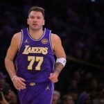 Dec 10, 2025; Los Angeles, California, USA; Los Angeles Lakers guard Luka Doncic (77) runs down court after a 3-point basket during the first half against the San Antonio Spurs at Crypto.com Arena. Mandatory Credit: Jayne Kamin-Oncea-Imagn Images