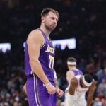 Nov 12, 2025; Oklahoma City, Oklahoma, USA; Los Angeles Lakers guard Luka Doncic reacts to a fan during the second quarter of a game against the Oklahoma City Thunder at Paycom Center. Mandatory Credit: Alonzo Adams-Imagn Images