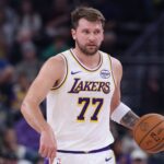 Nov 23, 2025; Salt Lake City, Utah, USA; Los Angeles Lakers guard Luka Doncic (77) brings the ball up the court against the Utah Jazz during the first half at Delta Center. Mandatory Credit: Rob Gray-Imagn Images