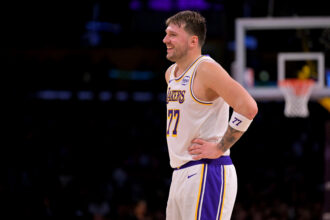 Dec 28, 2025; Los Angeles, California, USA; Los Angeles Lakers guard Luka Doncic (77) reacts after he was called for a foul in the second half against the Sacramento Kings at Crypto.com Arena. Mandatory Credit: Jayne Kamin-Oncea-Imagn Images