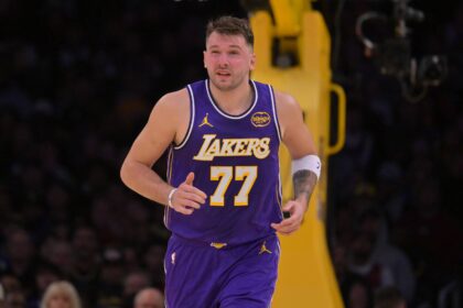 Los Angeles Lakers guard Luka Doncic (77) reacts after he was poked in the eye during the first half against the San Antonio Spurs at Crypto.com Arena.