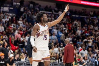 Dec 27, 2025; New Orleans, Louisiana, USA; New Orleans Pelicans guard Jose Alvarado (not pictured) gets into a scrum with Phoenix Suns center Mark Williams (15) over a play during the second half at Smoothie King Center. Mandatory Credit: Stephen Lew-Imagn Images