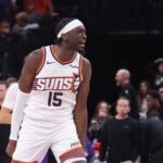 Oct 27, 2025; Salt Lake City, Utah, USA; Phoenix Suns center Mark Williams (15) reacts to tipping a ball in for a basket to tie the game against the Utah Jazz in the last seconds of the fourth quarter at Delta Center. Mandatory Credit: Rob Gray-Imagn Images