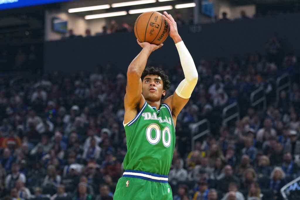 Dec 25, 2025; San Francisco, California, USA; Dallas Mavericks guard Max Christie (00) shoots against the Golden State Warriors during the first quarter at Chase Center. Mandatory Credit: Darren Yamashita-Imagn Images