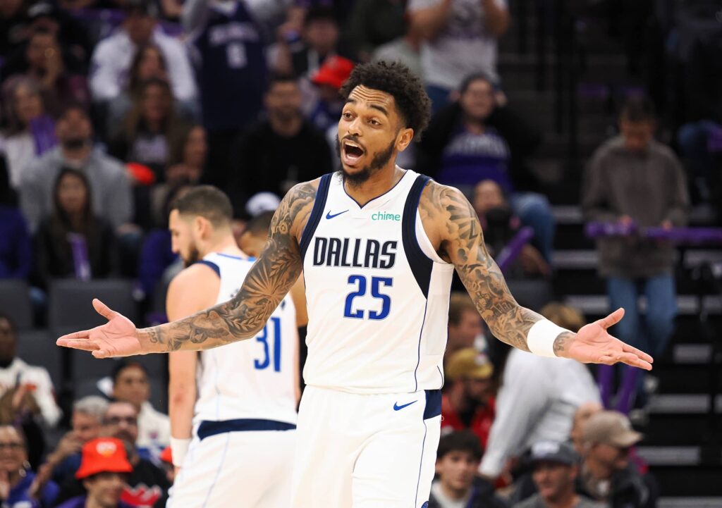 Dec 27, 2025; Sacramento, California, USA; Dallas Mavericks forward P.J. Washington Jr. (25) reacts after being called for an offensive foul against the Sacramento Kings during the fourth quarter at Golden 1 Center. Mandatory Credit: Kelley L Cox-Imagn Images