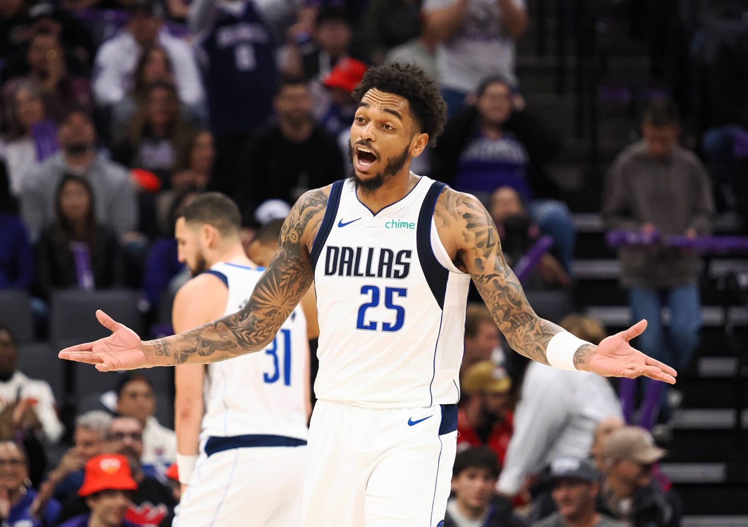 Dec 27, 2025; Sacramento, California, USA; Dallas Mavericks forward P.J. Washington Jr. (25) reacts after being called for an offensive foul against the Sacramento Kings during the fourth quarter at Golden 1 Center. Mandatory Credit: Kelley L Cox-Imagn Images