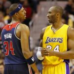 Washington Wizards forward Paul Pierce (34) talks to Los Angeles Lakers guard Kobe Bryant (24) at Verizon Center.