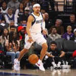 Dallas Mavericks guard Ryan Nembhard (9) controls the ball against the Sacramento Kings during the first quarter at Golden 1 Center.