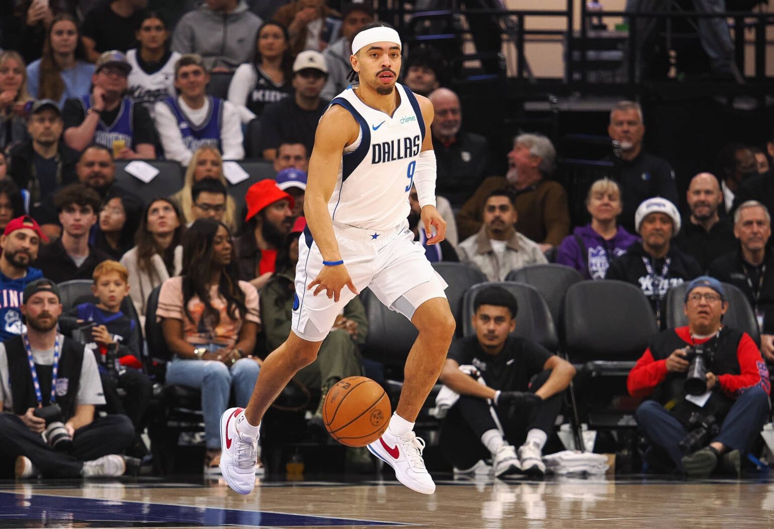 Dallas Mavericks guard Ryan Nembhard (9) controls the ball against the Sacramento Kings during the first quarter at Golden 1 Center.