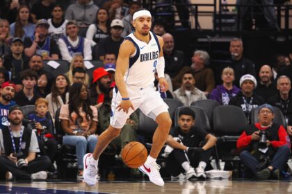 Dallas Mavericks guard Ryan Nembhard (9) controls the ball against the Sacramento Kings during the first quarter at Golden 1 Center.
