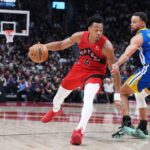 Dec 28, 2025; Toronto, Ontario, CAN; Toronto Raptors forward Scottie Barnes (4) controls the ball as Golden State Warriors guard Stephen Curry (30) tries to defend during the second quarter at Scotiabank Arena. Mandatory Credit: Nick Turchiaro-Imagn Images