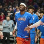 Nov 30, 2025; Portland, Oregon, USA; Oklahoma City Thunder guard Shai Gilgeous-Alexander (2) greets teammates during introductions before a game against the Portland Trail Blazers at Moda Center. Mandatory Credit: Troy Wayrynen-Imagn Images