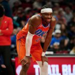 Nov 30, 2025; Portland, Oregon, USA; Oklahoma City Thunder guard Shai Gilgeous-Alexander (2) smiles at a fan during the second half in a game against the Portland Trail Blazers at Moda Center. Mandatory Credit: Troy Wayrynen-Imagn Images