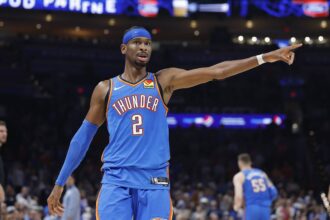 Nov 23, 2025; Oklahoma City, Oklahoma, USA; Oklahoma City Thunder guard Shai Gilgeous-Alexander (2) gestures to his team before a play against the Portland Trail Blazers during the second quarter at Paycom Center. Mandatory Credit: Alonzo Adams-Imagn Images