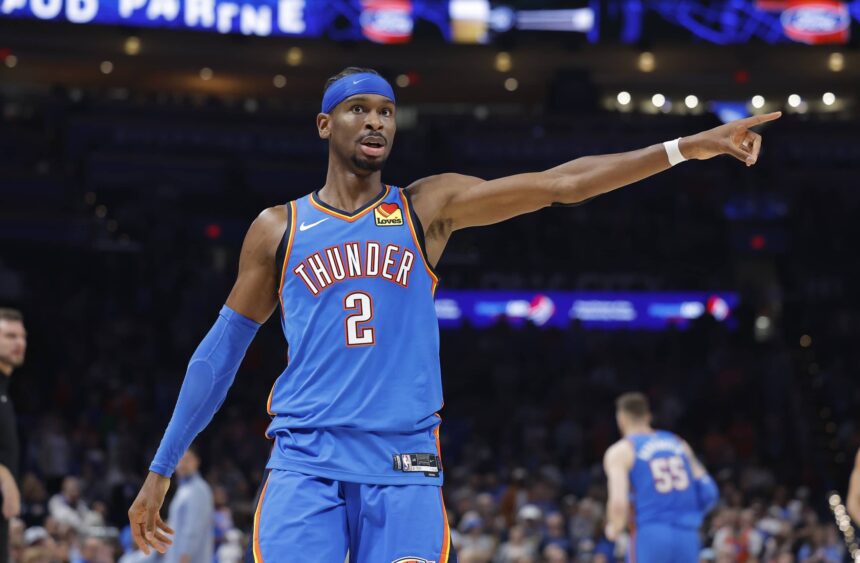 Nov 23, 2025; Oklahoma City, Oklahoma, USA; Oklahoma City Thunder guard Shai Gilgeous-Alexander (2) gestures to his team before a play against the Portland Trail Blazers during the second quarter at Paycom Center. Mandatory Credit: Alonzo Adams-Imagn Images