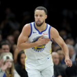 Dec 29, 2025; Brooklyn, New York, USA; Golden State Warriors guard Stephen Curry (30) reacts after making a three point shot against the Brooklyn Nets during the third quarter at Barclays Center. Mandatory Credit: Brad Penner-Imagn Images