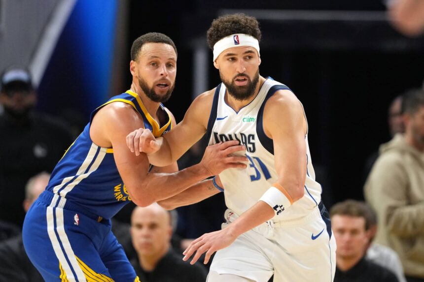 Dec 15, 2024; San Francisco, California, USA; Golden State Warriors guard Stephen Curry (left) defends against Dallas Mavericks guard Klay Thompson (31) during the fourth quarter at Chase Center. Mandatory Credit: Darren Yamashita-Imagn Images