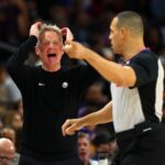 Dec 18, 2025; Phoenix, Arizona, USA; Golden State Warriors head coach Steve Kerr reacts against the Phoenix Suns in the second half at Mortgage Matchup Center. Mandatory Credit: Mark J. Rebilas-Imagn Images, top