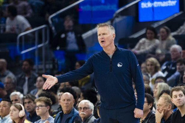 Dec 20, 2025; San Francisco, California, USA; Golden State Warriors head coach Steve Kerr reacts during the first quarter against the Phoenix Suns at Chase Center. Mandatory Credit: John Hefti-Imagn Images