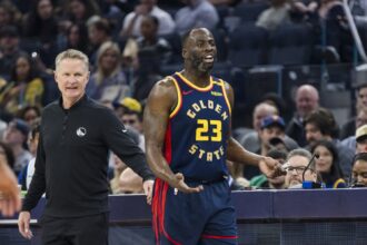 Jan 7, 2025; San Francisco, California, USA; Golden State Warriors forward Draymond Green (23) and head coach Steve Kerr react during the first quarter against the Miami Heat at Chase Center. Mandatory Credit: John Hefti-Imagn Images