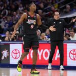 Nov 23, 2025; Philadelphia, Pennsylvania, USA; Philadelphia 76ers guard Tyrese Maxey (0) reacts against the Miami Heat in the first quarter at Xfinity Mobile Arena. Mandatory Credit: Kyle Ross-Imagn Images