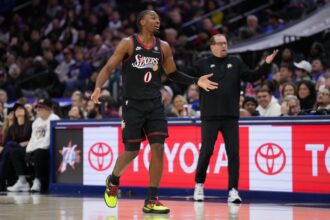 Nov 23, 2025; Philadelphia, Pennsylvania, USA; Philadelphia 76ers guard Tyrese Maxey (0) reacts against the Miami Heat in the first quarter at Xfinity Mobile Arena. Mandatory Credit: Kyle Ross-Imagn Images