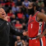 Nov 8, 2025; Inglewood, California, USA; Los Angeles Clippers head coach Tyronn Lue and guard James Harden (1) on the sidelines during the second half against the Phoenix Suns at Intuit Dome. Mandatory Credit: Jayne Kamin-Oncea-Imagn Images