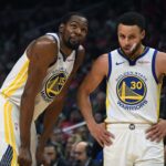 Apr 26, 2019; Los Angeles, CA, USA; Golden State Warriors guard Stephen Curry (30) and forward Kevin Durant (35) react in the first half of game six of the first round of the 2019 NBA Playoffs against the LA Clippers at Staples Center. Mandatory Credit: Kirby Lee-USA TODAY Sports